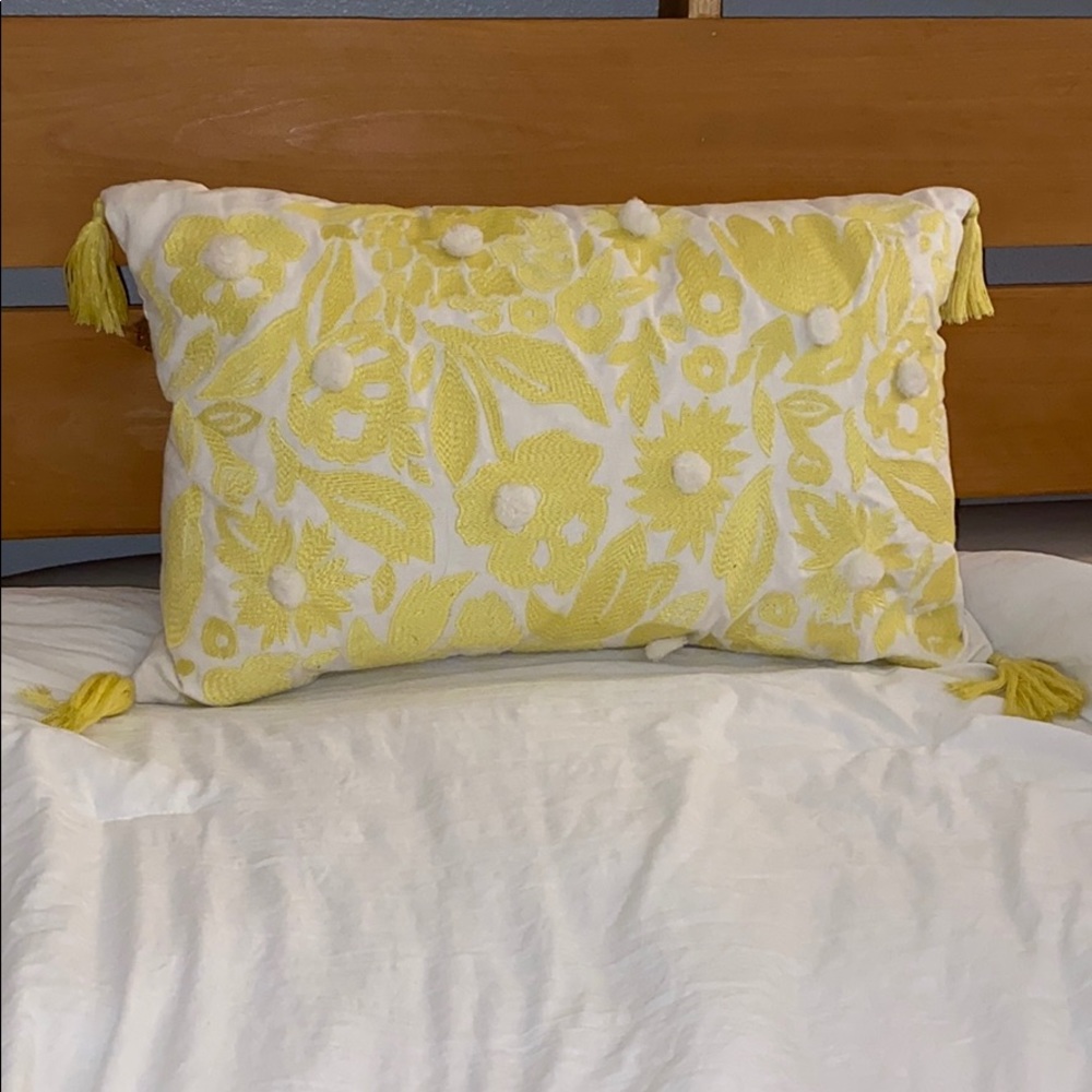 yellow throw tassel pillow